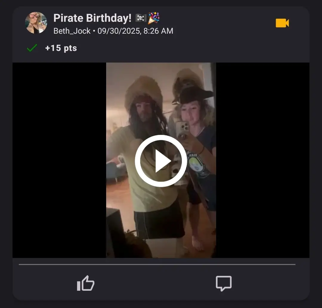 Three people dressed in pirate costumes posing in front of a mirror while recording a video